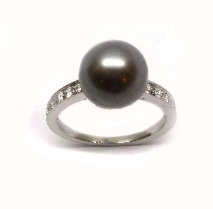 Early 20th century pearl and diamond ring